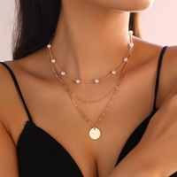 Mode Alien Perle Gland Collier Polyvalent En Gros Personnalisé Plaque Ronde Pendentif Multi Couche Portant Collier