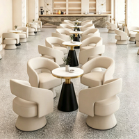 Fauteuil lounge moderne une place avec revêtement en tissu et pieds coniques pour hôtel, confort gain de place et rembourrage en éponge capitonnée