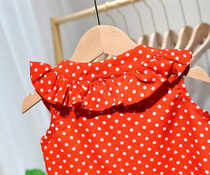 Distribuidor de Fábrica China, Ropa para Niñas, Conjuntos de Camiseta con Estampado de Lunares Color Mandarina y Minifalda de Encaje Extra Corta - Product Image 2