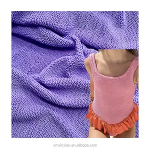 Popüler kırışık gofre jakarlı naylon spandex mayo kumaş için mayo elbise özelleştirilmiş renk bikini kumaş