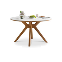 Table à manger ronde avec pieds en chêne massif en forme d'étoile et plateau en pierre, style minimaliste moderne pour petits appartements et restaurants