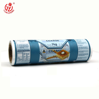 Film en rouleau laminé PE PET de qualité alimentaire imprimé sur mesure OEM ODM pour sachets, emballage de poudre de noix de coco, snacks et biscuits, 1KG 2KG
