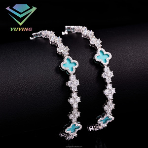 สร้อยข้อมือเทนนิสลายใบโคลเวอร์สี่แฉก ประดับเพชรโมอิสซาไนต์ VVS ชุบทอง เงินแท้ 925 ผ่านการทดสอบเพชร ได้รับการรับรองจาก GRA - Product Image 3