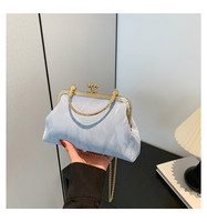 Sac à main élégant pour femme, nouvelle collection, couleur unie, tendance, avec fermoir, design de niche, bandoulière chaîne, forme coquille