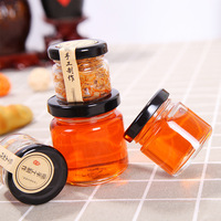 Khusus Kosong Selai Kacang Berbentuk Batu Api Kaca Mewah Toples Saus Makanan Acar Bumbu Jam Kaca Madu Jar dengan Tutup Hitam