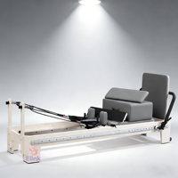 Reformer de Pilates en bois blanc écologique avec système à rail complet et tapis antidérapant pour un entraînement corporel complet en toute sécurité