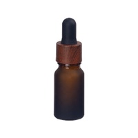 10 ml givré brun essentielle de bouteille en verre cosmétique paquet 10 ml givré ambre cosmétique bouteille avec 18/410 en bois gouttes