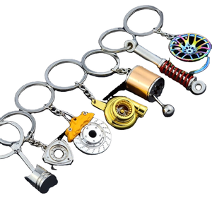 Portachiavi Auto in Lega di Zinco a Forma di Pistone, Turbo, Ingranaggio, Disco Freno, Ammortizzatore - Tema Sportivo, Regalo Portatile - Product Image 1