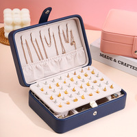 Boîte à bijoux portable carrée en cuir PU, organisateur minimaliste pour boucles d'oreilles et bagues, fermeture à boucle, étui de rangement pour bijoux de voyage