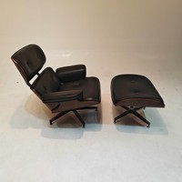 Fauteuil lounge en cuir PU avec repose-pieds, dossier en contreplaqué courbé, structure extérieure en alliage d'aluminium