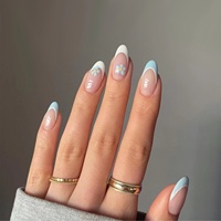 Faux ongles en acrylique à bout français motif fleur bleue, nude, forme amande, design petite marguerite, 24 pièces, collection printemps