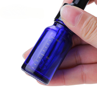 Bouteille d'huile essentielle de 10ml flacon compte-gouttes gradué sérum Essence emballage vert Mini bouteille en verre cosmétique sérigraphie bleu