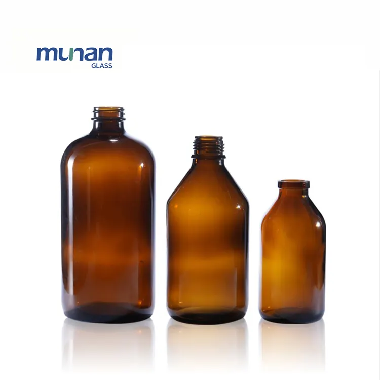 زجاجة من الزجاج المصبوب من النوع العنبر من البلاستيك والألومنيوم مع غطاء من الفلين للاستخدام التجميلي