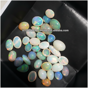 โอปอลธรรมชาติจากเอธิโอเปีย สีฟ้าและสีขาว รูปทรงรี สำหรับทำเครื่องประดับ ขนาดและสีหลากหลาย 127 ตัวอักษร - Product Image 1
