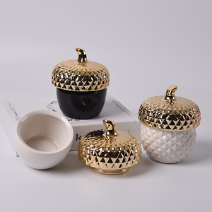 Fashion new Harvest design ceramic golden and white embossed acorn shape mason jar candle storage jars with lid