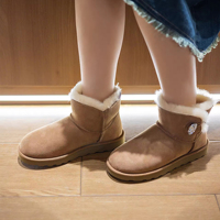 Fournisseur OEM ODM de bottes en peau de mouton avec semelle extérieure en EVA, bottes de neige en fourrure de peau de mouton 100%