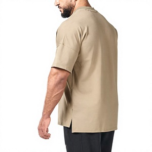T-shirt blanc surdimensionné pour homme 100 % coton, col rond, manches courtes, logo frontal, style minimaliste uni, coupe ample, tricot jersey, couleur unie - Product Image 3