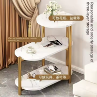 Table d'appoint ovale moderne de luxe personnalisée, petite table basse 3 niveaux or et blanc, structure en acier inoxydable, pour extérieur/atelier