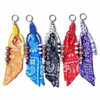 En gros : Breloque de sac perlée style bandana Paisley, breloque de sac bohème western en corde nouée à la main, pendentif de sac perlé thème football pour le jour du match