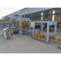 Machine automatique de fabrication de briques QT10-15 pour la production de blocs creux en béton, de briques pleines et de dalles de pavage colorées emboîtables
