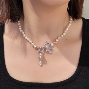 Nouveauté été : Collier de luxe abordable pour femme, style Western, en tungstène plaqué or, avec pendentif Orb Planète, nœud, goutte d'eau et perle - Product Image 1