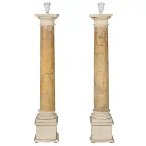 米色天然大理石柱装饰罗马柱，用于房屋或婚礼