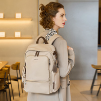 Sac à dos imperméable pour femme avec protection RFID, capacité moyenne, design ergonomique pour les voyages d'affaires et l'usage quotidien