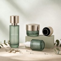 Ensemble de flacons pompe en verre givré vert forêt premium avec bouchon miroir doré, emballage luxueux pour soins de la peau botaniques