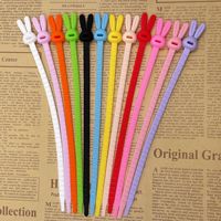 Dessin animé lapin motif Silicone câble torsadé corde sangle cravates colle enrobée corde ceinture couleur Silicone cravate