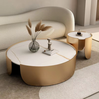 Ensemble de tables basses gigognes rondes extensibles en pierre frittée, style moderne de luxe, avec base tambour couleur or champagne, personnalisable pour salon