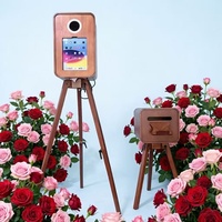 Photomaton rétro classique compatible avec les appareils photo reflex numériques et les iPad, adapté aux mariages et aux événements.