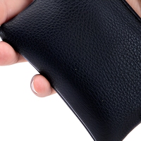 Porte-monnaie mini en cuir noir de luxe avec fermeture éclair, porte-cartes de crédit, étui pour écouteurs, pochette porte-clés portable
