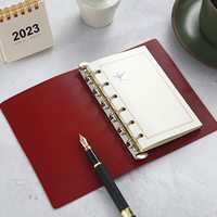 Mécanisme d'anneau personnalisé d'usine professionnelle ouvert en métal 6 anneaux de livre de reliure à anneaux A7 pour cahier de calendrier
