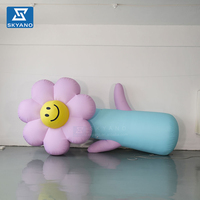 Modèle de plante géante gonflable rose personnalisé pour la décoration de sites touristiques extérieurs, de scènes et d'événements commerciaux