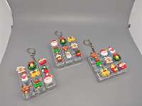 Schattig Kerstmis 9-vakjes fidget toy knoop sleutelhanger draagbaar sensorisch promotie speelgoed feestdagen souvenir tas charme sleutelhanger voor kinderen