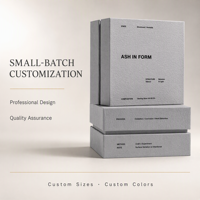 Boîte-cadeau grise en carton avec couvercle et base, emballage personnalisé avec logo pour présentation haut de gamme en magasin