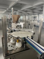 Machine de positionnement de bouteilles rotative avec commande PLC pour lignes de remplissage Keypack