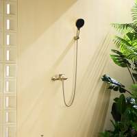 Mitigeur de bain et de douche à trois fonctions en laiton massif, à montage apparent au sol, avec douchette à main en ABS et cartouche céramique double