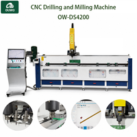 Machine de perçage et de fraisage CNC en aluminium OUWO 4200MM pour fenêtres et portes avec magazine d'outils pour usine de murs-rideaux