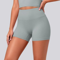 Shorts de yoga personnalisés en gros à séchage rapide, motif uni, respirants, rehausseurs de fessiers, pour la course, le sport et le fitness, shorts de gym taille haute