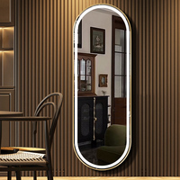 Miroir LED intelligent en vente chaude pour salon, forme ovale, miroir de salle de maquillage, utilisation dans les clubs, les hôtels, miroir mural anti-buée