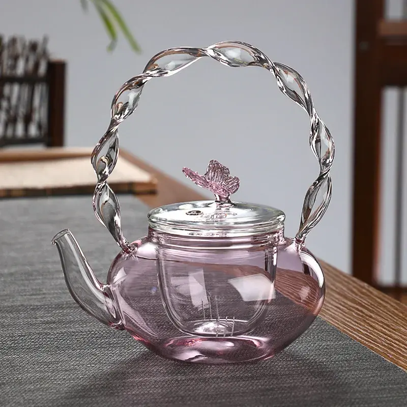 गर्म बिक्री उच्च बोरोसिलिकेट ग्लास ट्विस्ट पैटर्न गुलाबी बीम केतली क्टल क्वथरी ग्लास टेपबोट चाय सेट 700 मिली