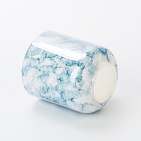 Pot à bougie en céramique élégant à motif de marbre bleu