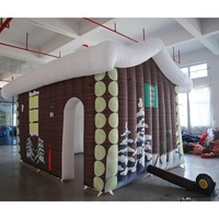 Livraison aérienne gratuite à porte, 2025 nouveaux produits de maison gonflable de Noël, 5x4m grande maison de cabine gonflable Santa Grotto santa