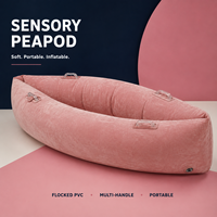 Chaise sensorielle Peapod pour enfants avec parois gonflables en PVC floqué, poignées de maintien et siège en forme de cocon pour programmes de vente au détail personnalisés