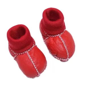 Botas de bebé cálidas y peludas, zapatos de piel de oveja Natural, nuevos