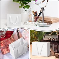 Sac en papier kraft de luxe imprimé avec poignée pour emballage cadeau, shopping, rangement, bijoux et cosmétiques – Vente en gros