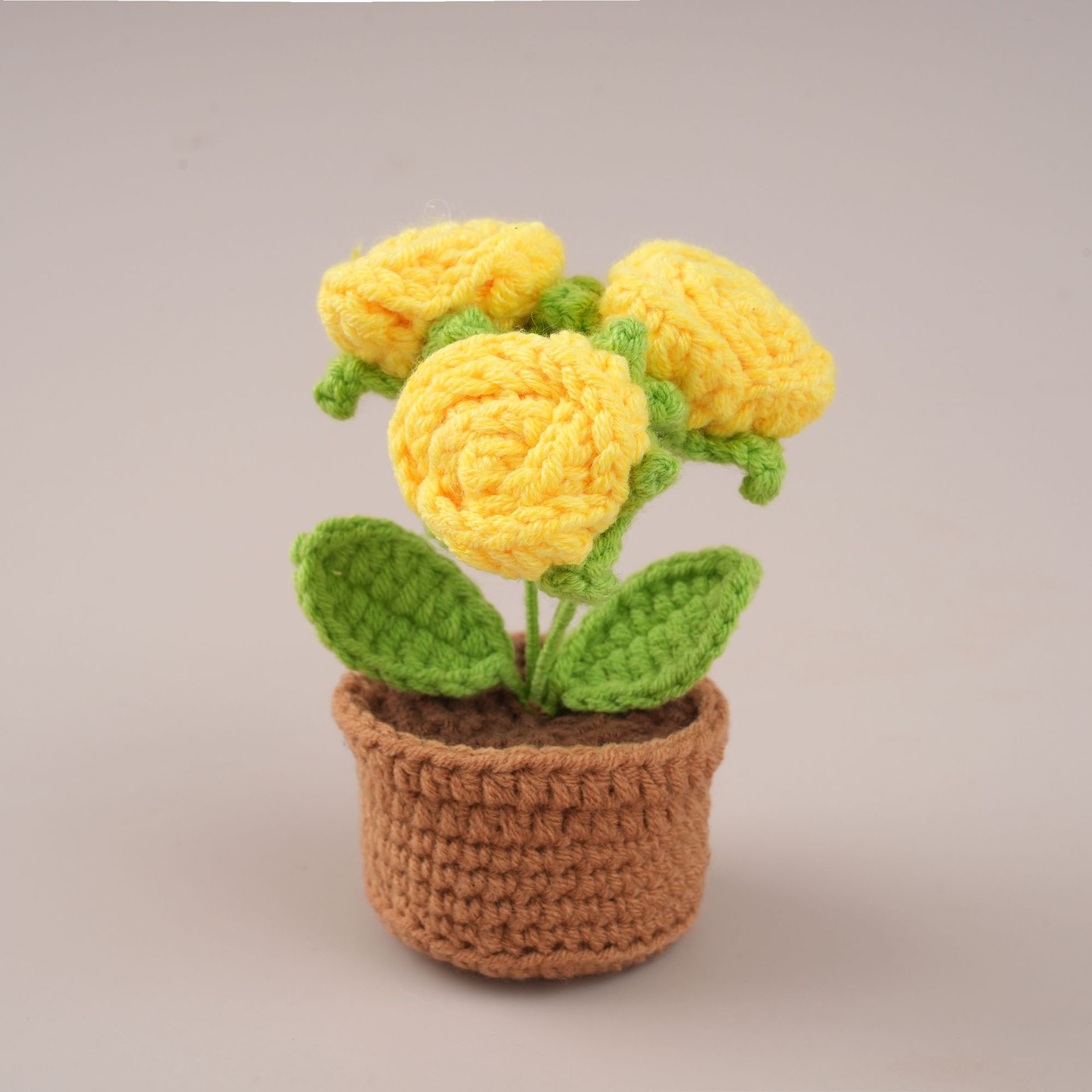 Yellow three-headed rose potted plant