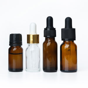 Botella de Vidrio Ámbar Transparente de 30 ml con Gotero para Aceites Esenciales, con Gotero Blanco y Negro - Product Image 1