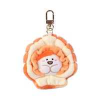 Porte-clés en peluche oursin noir audacieux, breloque de sac mignonne avec centre jaune, jouet unique contrastant pour le streetwear